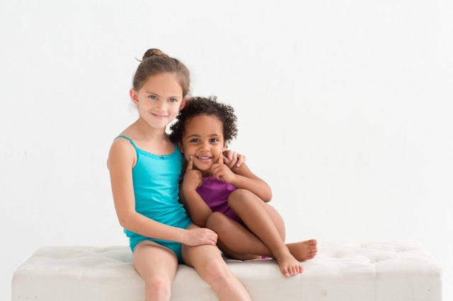 Two girls in camisoles and underpants