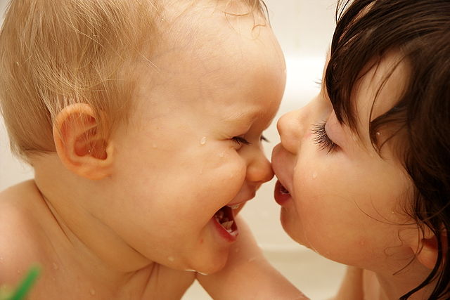 two small children in bathtub