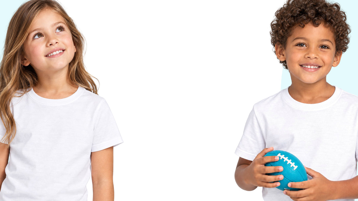 a young girl and young boy wearing white t-shirts