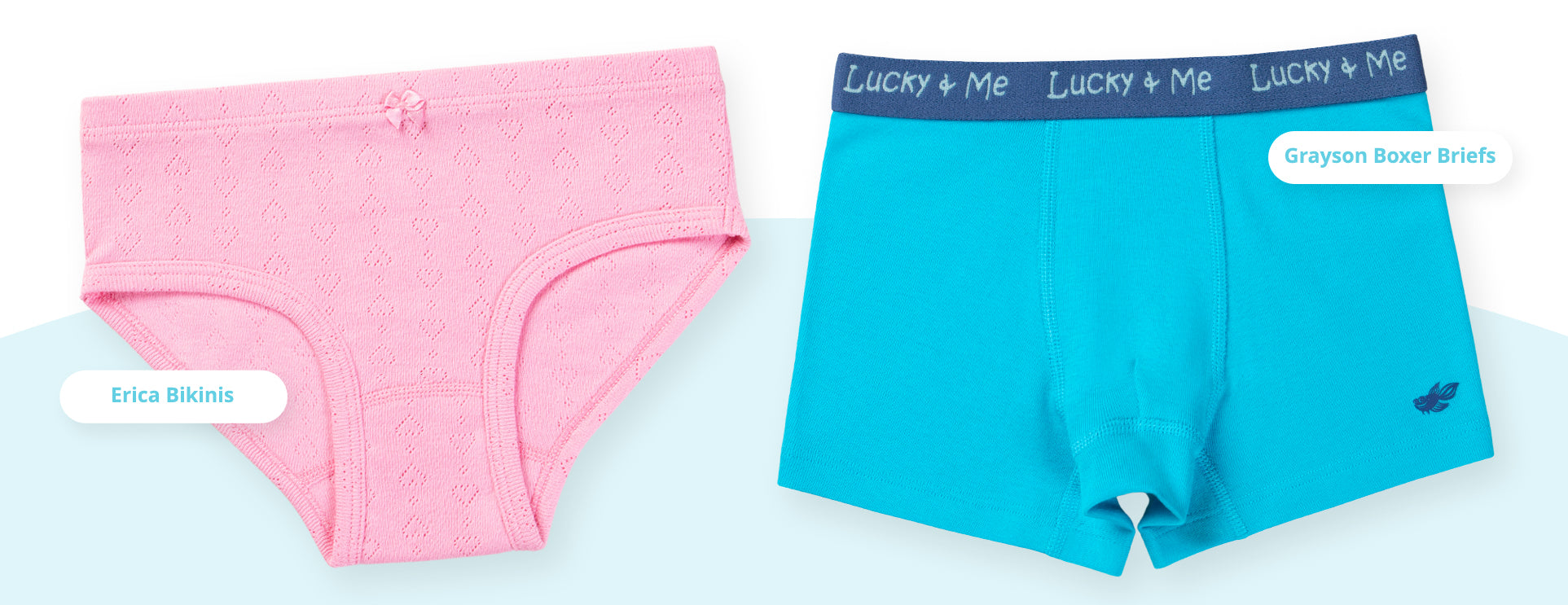 Pink and blue underwear with 'Lucky & Me' branding on a light gray background