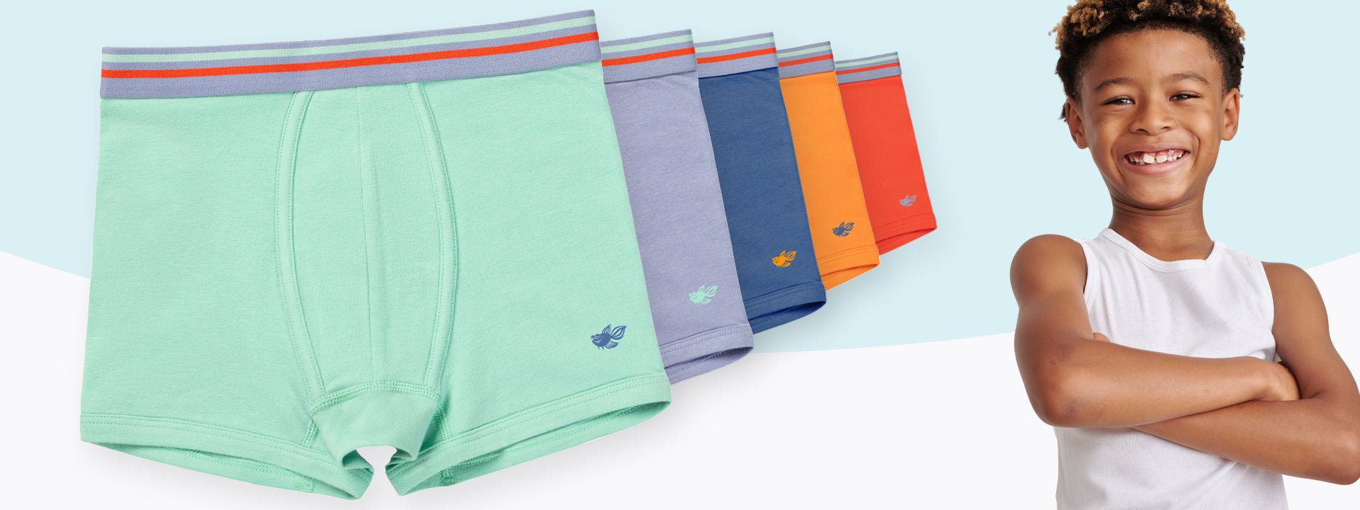 Set of colorful boys' cotton model boxer brief underwear with a boy wearing a white tank top on a light blue background
