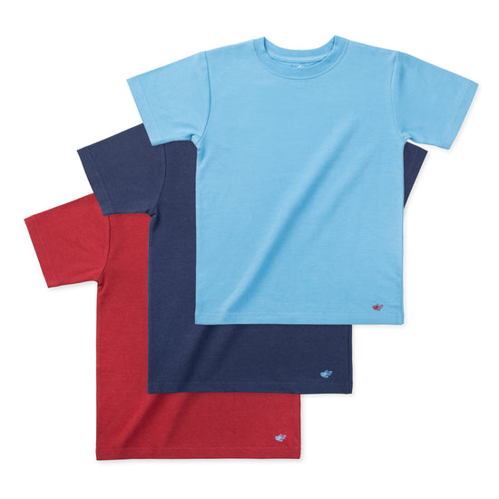 Three t-shirts in blue, red, and navy on a white background