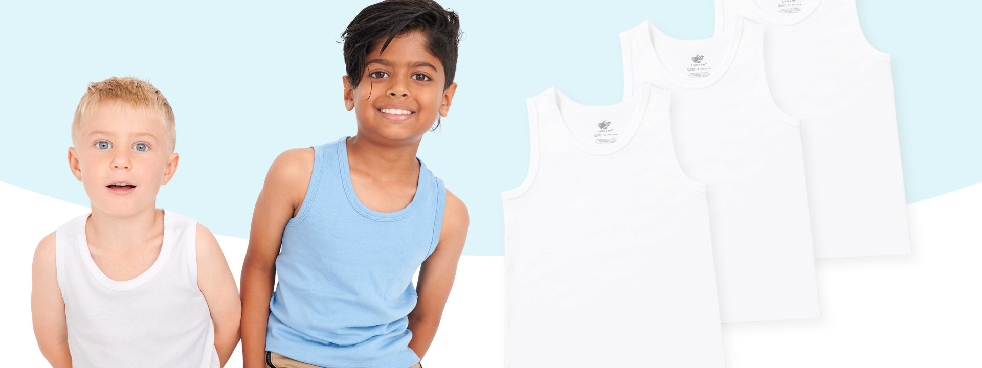 Two boys wearing organic cotton tank tops with a display of tank tops in the background.